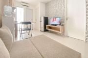 Modern Look 2BR at Bassura City Apartment By Travelio