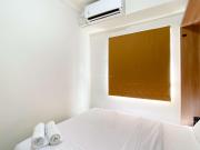 Comfort Designed 2BR Green Pramuka City Apartment By Travelio