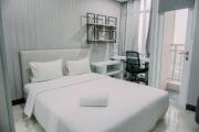 Homey and Comfy Stay Studio Apartment at B Residence By Travelio