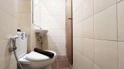 Compact Studio Room Apartment Vida View Makassar By Travelio