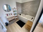 T2 spacieux avec baignoire Balnéo en RdC sur cour