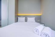 Restful and Homey 2BR at Transpark Cibubur Apartment By Travelio