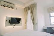 Homey and Cozy Stay Studio Belmont Residence Puri Apartement By Travelio