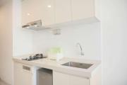 Nice and Cozy Studio Sky House BSD Apartment By Travelio