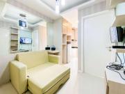 Homey Apartment with 1BR at Parahyangan Residence By Travelio