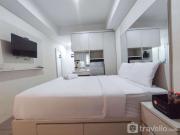 Warm and Cozy Style Studio Room at Paltrow City Apartment By Travelio