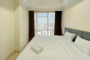Spacious and Combined 2BR at Menteng Park Apartment By Travelio