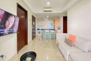 Spacious and Comfort Living 2BR at Menteng Park Apartment By Travelio