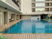 Minimalist and Homey 1BR at Ciputra World 2 Apartment By Travelio