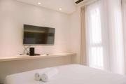 Homey and Warm Studio Amazana Serpong Apartment By Travelio