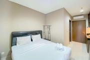 Cozy and Minimalist Studio Room Ciputra International Apartment By Travelio