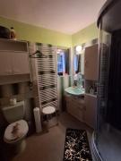 Pokoj v rodinném se sdílenou koupelnou