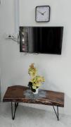 Top Tanah Merah