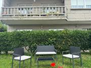 Acogedor apartamento con jardín