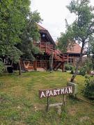 Apartman egy Makovecz Imre tervezte házban Apartman egy Makovecz Imre tervezte házban