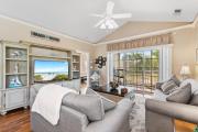 Serene Getaway Balcony Oasis with Pool & Golf Course Views by myBeach Vacation Rentals