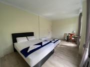 A Spacious Tropical 4 Bedrooms with Bathrooms Villa Marion Tomohon with the view of Gunung Lokon