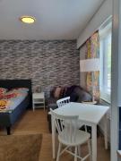 Kompakti yksiö numero 6 pienkerrostalossa