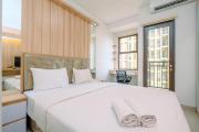 Cozy Living and Homey Studio Transpark Cibubur Apartment By Travelio