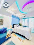 Ocean theme Navy Blue Deluxe Suite with PS4 and Balcony overlooking Manila Bay and Manila Zoo plus near Manila Yacht Club and Star City