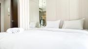 Simple and Cozy Living Studio Transpark Cibubur Apartment By Travelio