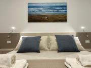 Virgilio hosting Casa Nuovissima Vista Mare