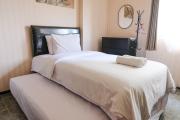 Homey and Cozy Studio Room at Suites @Metro Apartment By Travelio