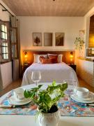 Suíte frente mar com cozinha e quintal pés na areia