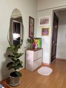 Apto no centro, arte e conforto