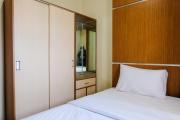 Homey 2BR at Suites @Metro Apartment By Travelio