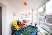 Bunter Hund Apartments - Zentrales Apartment, Parkplatz, Wintergarten, Kinderzimmer