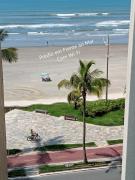 PRÉDIO EM FRENTE AO MAR