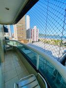 Pé na areia Guilhermina