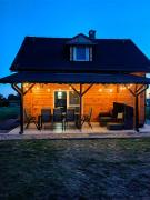 Pałuckie Chaty domek z balia i sauną widok na jezioro