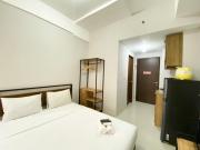 Chic and Cozy Studio Apartment at Transpark Juanda Bekasi By Travelio