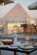 Aziz Palace Front Pyramids View & Rooftop Restaurant
