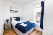Stylish 2 bedroom apartment next to Train Station Stylish 2 bedroom apartment next to Train Station