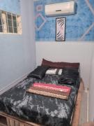 Quarto refrigerado com cama de casal