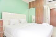 Comfort Living and Homey Studio Signature Park Grande Apartment By Travelio