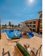 Apartamento de Lujo en Playa Jacó, Frente al Mar, Wifi, AC, Parqueo Privado y Piscinas