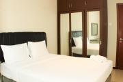 Great Location and Comfy 2BR Apartment at Thamrin Residence By Travelio
