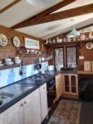 Puddle Duck Peeps Out Chalet