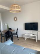 F2 neuf cosy et élégant avec terrasse, parking, WIFI