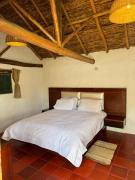 Bella casita de adobe vía a la laguna de Tota