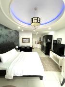 Deluxe room with king bed and Balcony at Kandi Palace