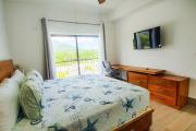 Spacious Overlooking Green One