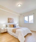 Bright bedroom with private bathroom