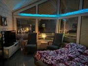 A cozy house with a guesthouse by the river