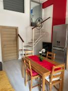 Comfy apartment with low ceiling attic