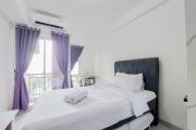 Minimalist and Homey Studio Akasa Pure Living BSD Apartment By Travelio